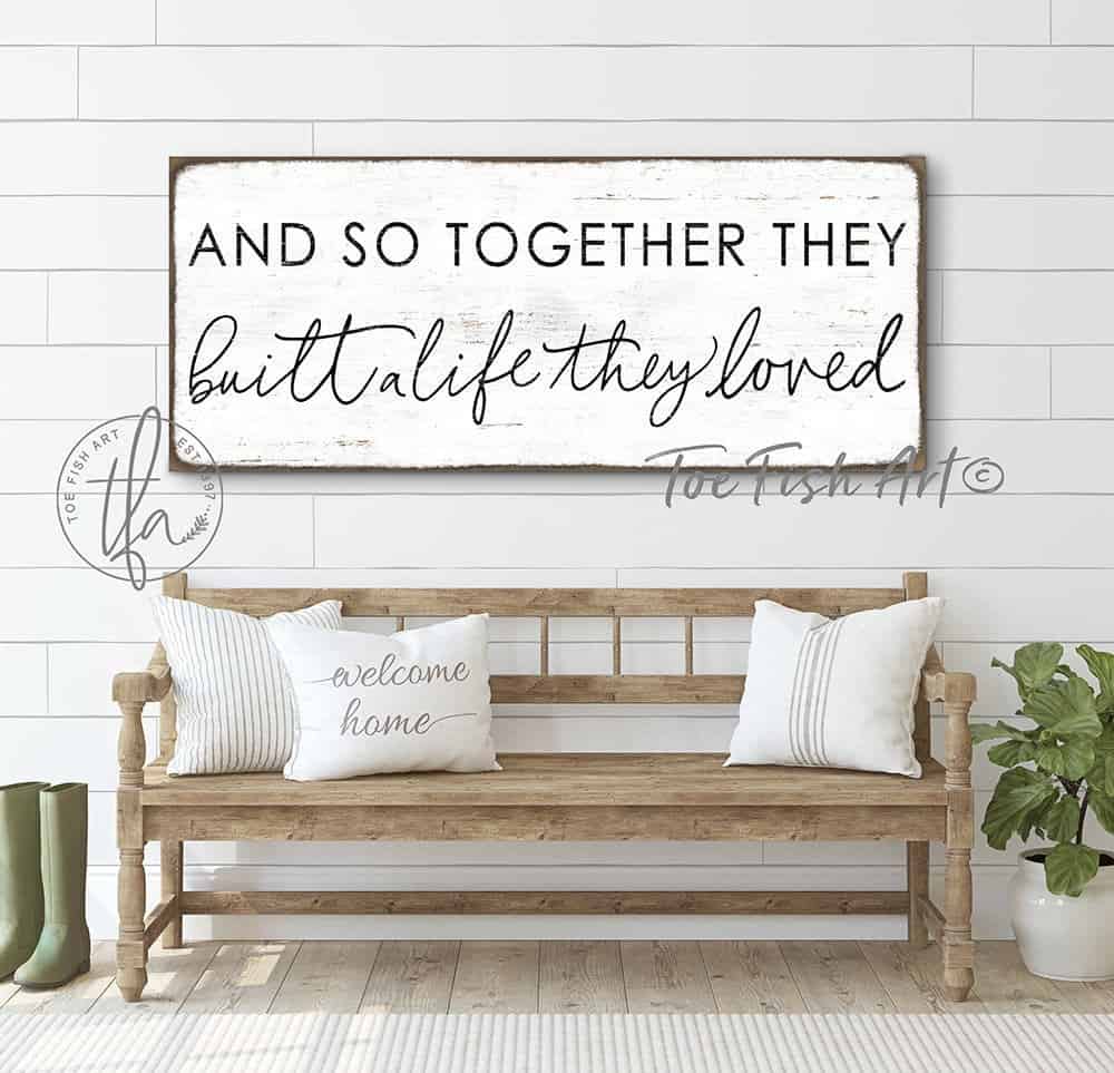 And So Together They Built A Life They Loved Sign handmade by ToeFishArt. Original, custom, personalized wall decor signs. Canvas, Wood or Metal. Rustic modern farmhouse, cottagecore, vintage, retro, industrial, Americana, primitive, country, coastal, minimalist.