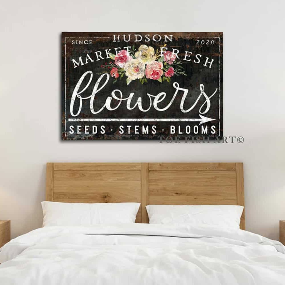 The perfect Mother's Day gift that lasts far longer than flowers. Personalize this stunning Toe Fish Art Market Fresh Flowers sign to create a keepsake Mom will treasure for years. Be surrounded by decor you LOVE! Choose between premium framed canvas or durable outdoor metal. Toe Fish Art makes artisan wall art with American materials. Proudly Made in the USA, each piece is expertly constructed with genuine craftsmanship, heritage quality, and rustic charm.