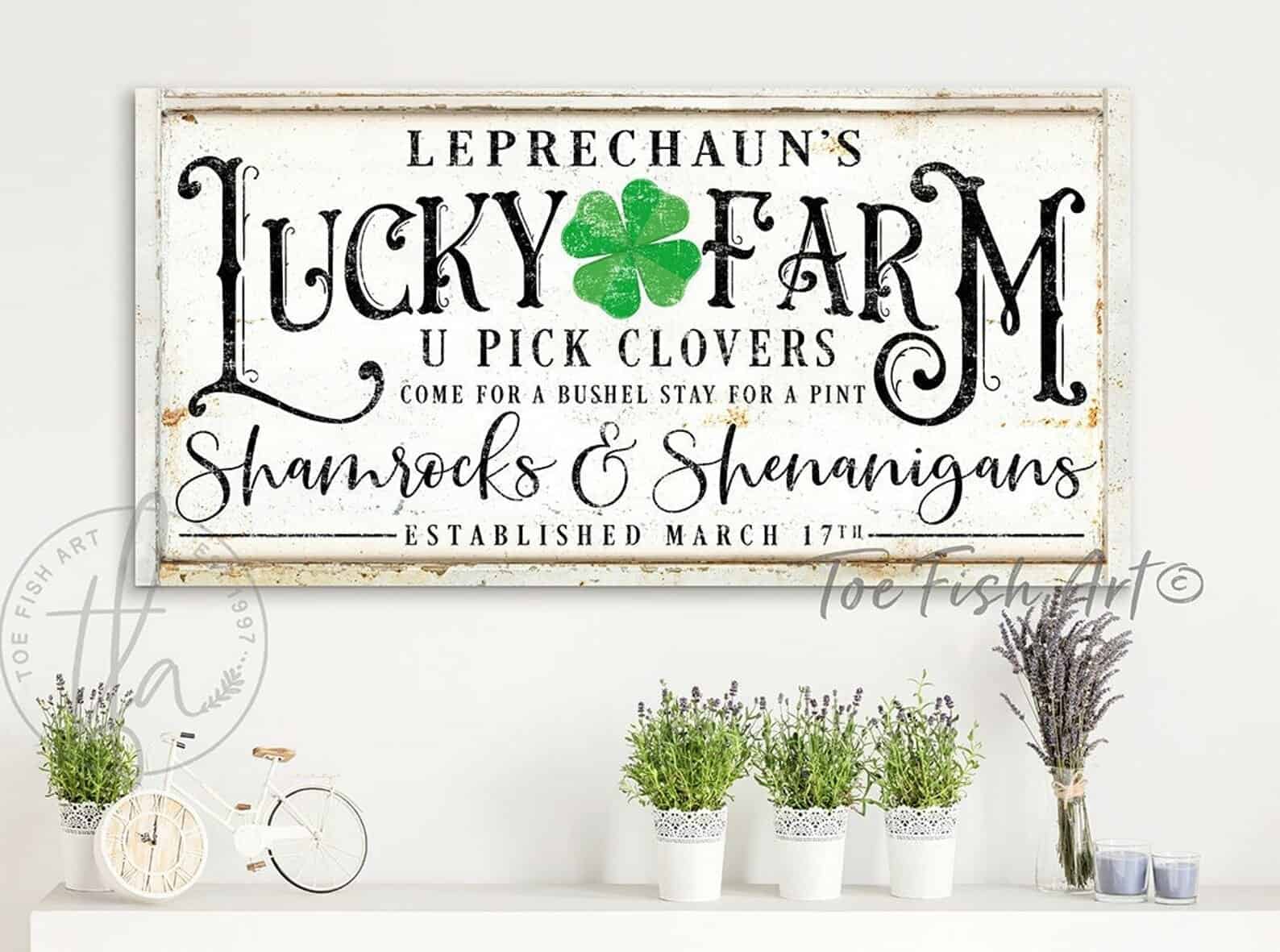 Leprechaun’s Lucky Farm Sign St Pattys Day Decoration handmade by ToeFishArt. Original, custom, personalized wall decor signs. Canvas, Wood or Metal. Rustic modern farmhouse, cottagecore, vintage, retro, industrial, Americana, primitive, country, coastal, minimalist.