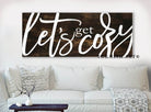 Let's Get Cozy Sign handmade by ToeFishArt. Original, custom, personalized wall decor signs. Canvas, Wood or Metal. Rustic modern farmhouse, cottagecore, vintage, retro, industrial, Americana, primitive, country, coastal, minimalist.