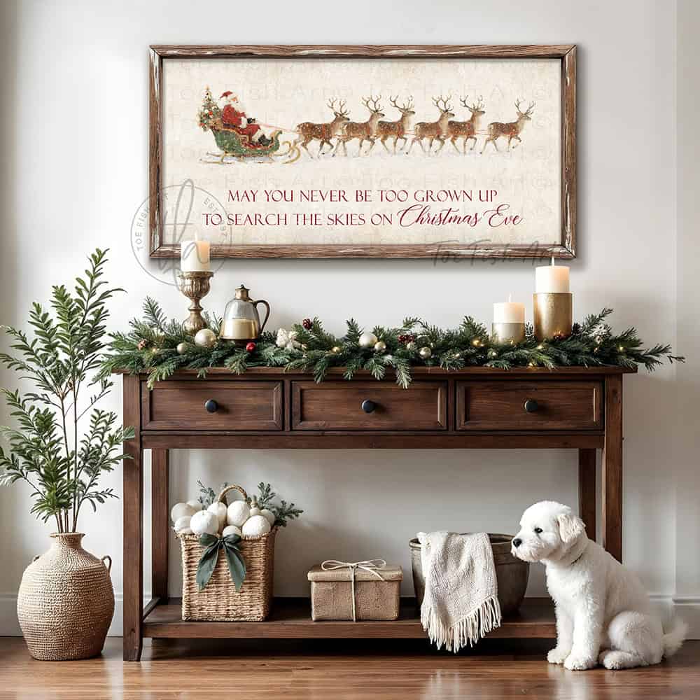 Rustic Christmas wall art featuring Santa Claus in a sleigh pulled by reindeer with the quote “May You Never Be Too Grown Up to Search the Skies on Christmas Eve.” Vintage farmhouse holiday décor perfect for adding nostalgic Christmas charm to your home.