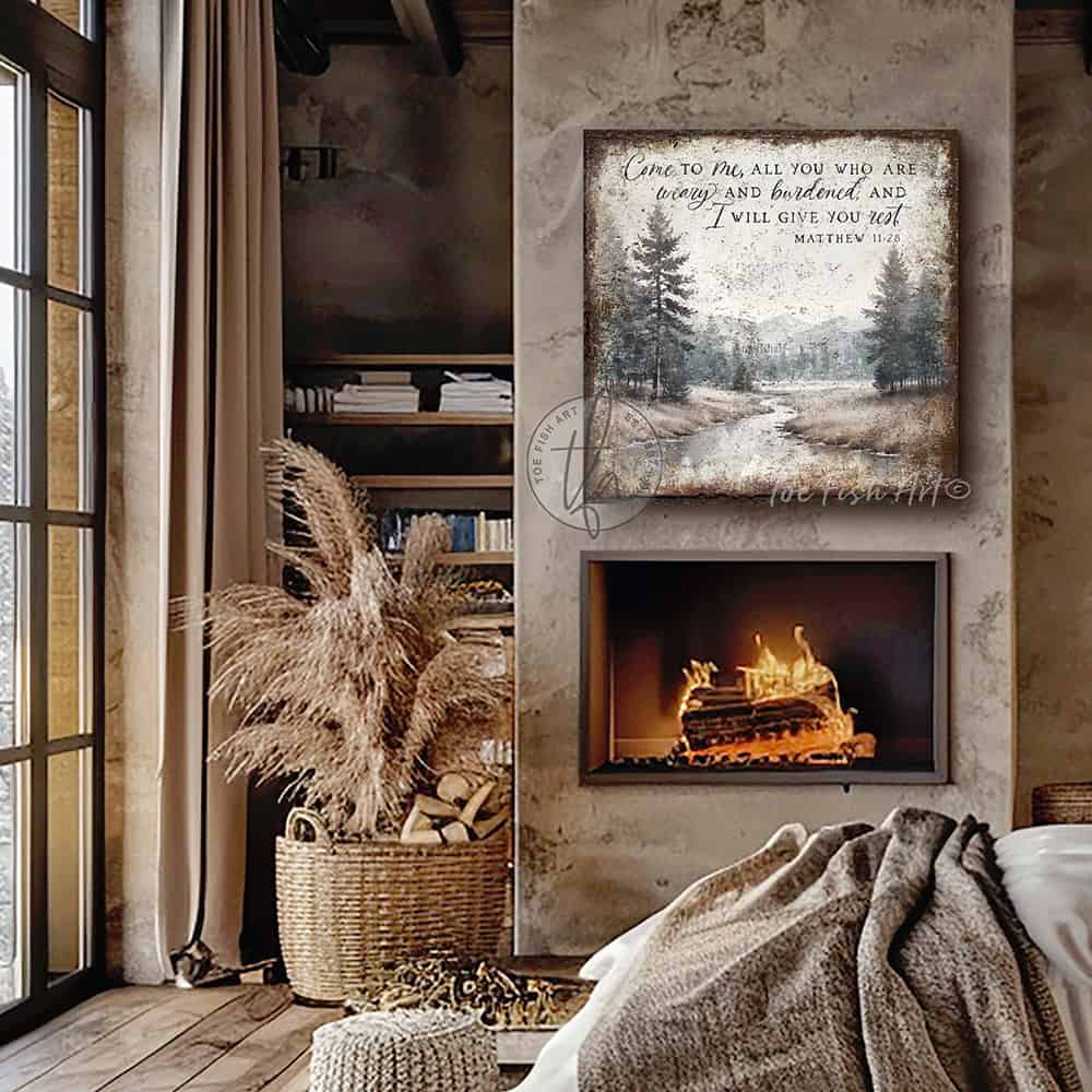 Decorate your home with words that inspire and bring peace to your space with our Vintage Scripture Wall Art 'Come To Me All Who Are Weary' Matthew 11:28, featuring a serene forested river and mountain range painting. Be surrounded by decor you LOVE! Choose premium gallery-stretched canvas or elegant framed canvas. Toe Fish Art makes artisan wall art with American materials. Proudly Made in the USA, each piece is expertly constructed with genuine craftsmanship, heritage quality, and rustic charm.