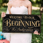 Welcome to Our Beginning personalized vintage-inspired wedding sign by Toe Fish Art, featuring couple’s names and date, gorgeous vintage black background with rustic gold lettering, available as framed canvas or outdoor waterproof metal — a unique, rustic chic wedding ceremony and reception keepsake decoration, designed and handcrafted in the USA. Ideal for indoor and outdoor spaces. Built to last with genuine craftsmanship, this authentic sign adds classic charm and heritage quality to your special day.