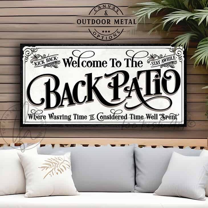 Welcome to the Back Patio personalized wall sign by Toe Fish Art in vintage black and white scroll style, available in framed canvas or waterproof outdoor metal, with custom family name and fun sayings like Kick Back, Stay Awhile, and Where Wasting Time is Considered Time Well Spent—charming backyard or patio decor handmade in the USA. Perfect for enhancing your outdoor summer decor. Built to last with genuine craftsmanship, this authentic sign adds rustic cottage charm and heritage quality to any home.