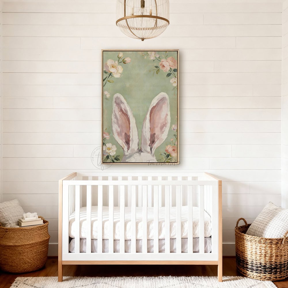 Hop into spring with this vintage floral bunny wall decor by Toe Fish Art! Using soft green and pink pastels, this cottagecore artwork brings a playful vibe with adorable bunny ears peeking up through flowers. Whether decorating a cozy bedroom, nursery, or Easter festivities and gifts, this framed piece brings instant charm. Toe Fish Art makes artisan wall décor using American sourced materials. Proudly Made in the USA and expertly constructed with genuine craftsmanship, heritage quality, and rustic charm.