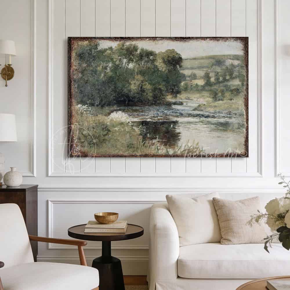 This landscape artwork by Toe Fish Art captures rural tranquility with a spring river meadow scene steeped in cottagecore tradition. The imagery balances nostalgic charm with sophisticated elegance. Available in framed canvas or weather-resistant outdoor metal in numerous sizes to fit your space. Toe Fish Art creates artisan-made wall décor using American sourced materials. Proudly Made in the USA, each sign is expertly constructed with genuine craftsmanship, heritage quality, and rustic charm.