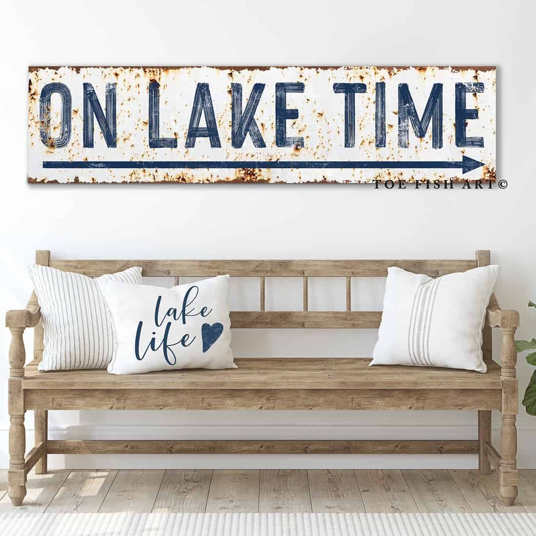 Toe Fish Art's "On Lake Time", "On Beach Time, "On Ocean Time, "On River Time" sign, or your own custom wording, in classic nautical navy blue and white, designed in rustic, vintage style for your home, vacation home or rental. Be surrounded by decor you LOVE! Choose between premium framed canvas or durable outdoor metal. Toe Fish Art makes artisan wall art with American materials. Proudly Made in the USA, each piece is expertly constructed with genuine craftsmanship, heritage quality, and rustic charm.