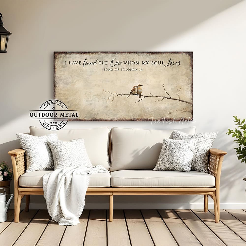 This faith-based wall decor brings the message "I Have Found the One Whom My Soul Loves" to your home through a quaint depiction of two love birds sharing a quiet moment. The artwork conveys a sense of peace, calm, and deep connection. Choose between premium framed canvas or durable outdoor metal. Toe Fish Art makes artisan wall art with American materials. Proudly Made in the USA, each piece is expertly constructed with genuine craftsmanship, heritage quality, and rustic charm.