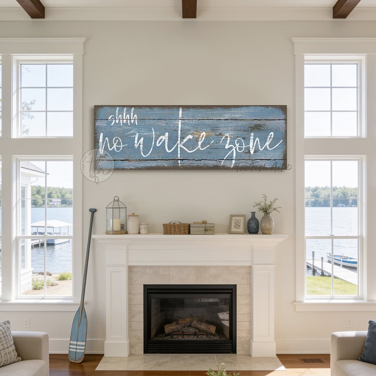 Bring laid-back lake life to your space with Toe Fish Art's "Shhh… No Wake Zone" sign. Featuring a weathered rustic blue finish, hand-lettered white typography, and the look of reclaimed wood, this timeless but trendy design adds relaxed coastal vibes. Choose between premium framed canvas or durable outdoor metal. Toe Fish Art makes artisan wall art with American materials. Proudly Made in the USA, each piece is expertly constructed with genuine craftsmanship, heritage quality, and rustic charm.