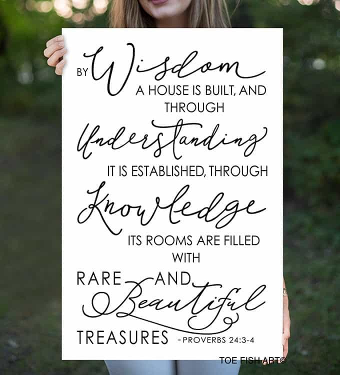 By Wisdom a House is Built Sign handmade by ToeFishArt. Original, custom, personalized wall decor signs. Canvas, Wood or Metal. Rustic modern farmhouse, cottagecore, vintage, retro, industrial, Americana, primitive, country, coastal, minimalist.