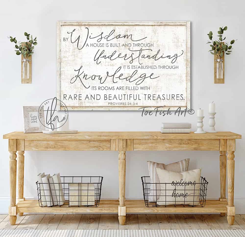 By Wisdom a House is Built Sign handmade by ToeFishArt. Original, custom, personalized wall decor signs. Canvas, Wood or Metal. Rustic modern farmhouse, cottagecore, vintage, retro, industrial, Americana, primitive, country, coastal, minimalist.