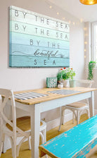 By the Sea Sign handmade by ToeFishArt. Original, custom, personalized wall decor signs. Canvas, Wood or Metal. Rustic modern farmhouse, cottagecore, vintage, retro, industrial, Americana, primitive, country, coastal, minimalist.