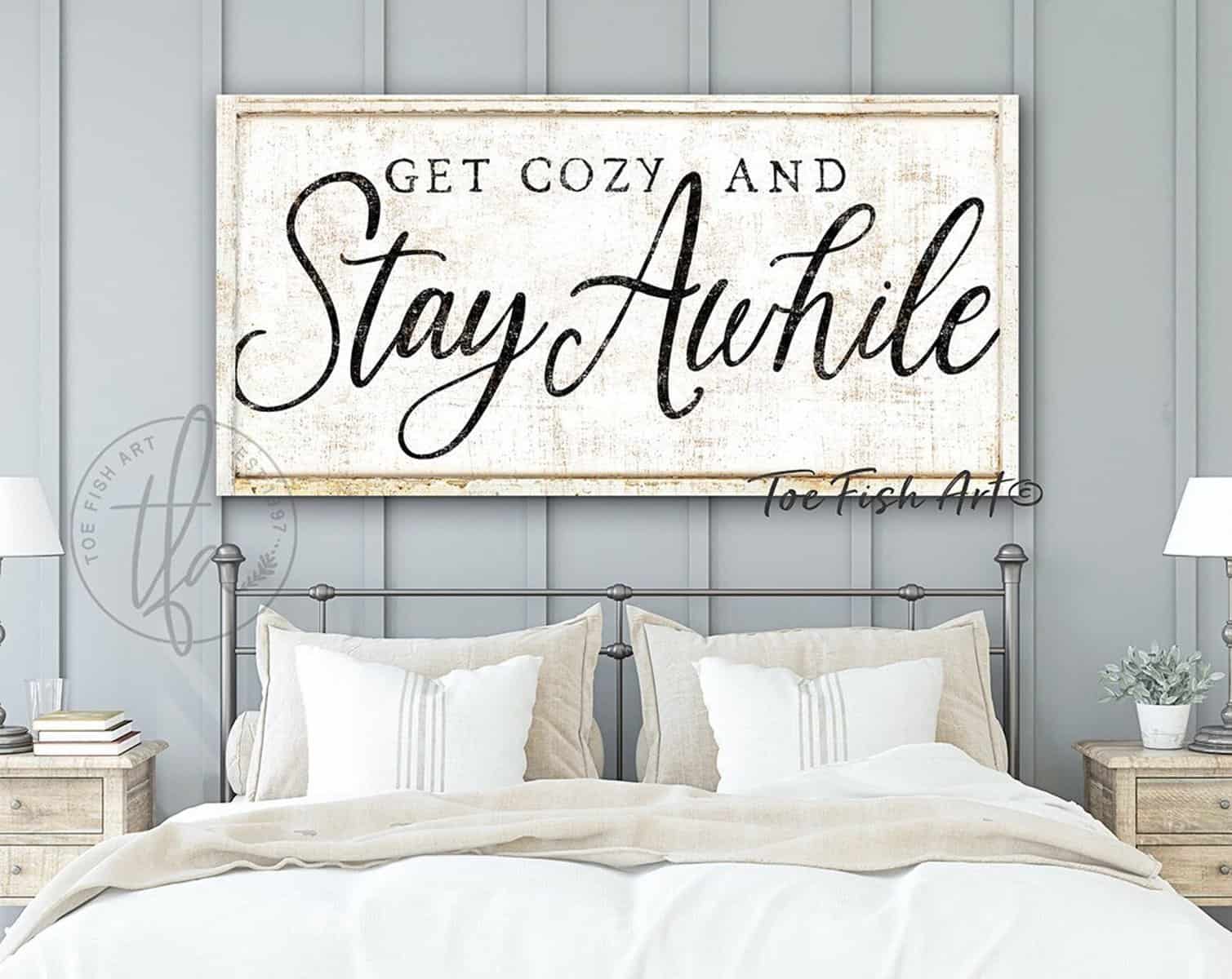Get Cozy and Stay Awhile Sign handmade by ToeFishArt. Original, custom, personalized wall decor signs. Canvas, Wood or Metal. Rustic modern farmhouse, cottagecore, vintage, retro, industrial, Americana, primitive, country, coastal, minimalist.