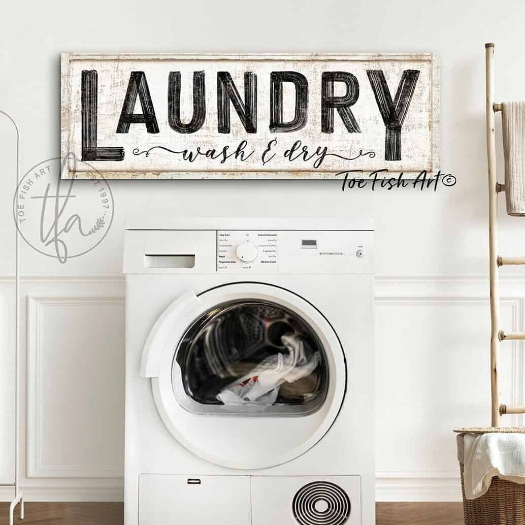 Add a fun touch to your laundry room, utility room, or mudroom with the witty wording of Toe Fish Art's Laundry Sign. This piece adds vintage modern farmhouse flair to any home. Be surrounded by decor you LOVE! Choose between premium framed canvas or durable outdoor metal. Toe Fish Art makes artisan wall art with American materials. Proudly Made in the USA, each piece is expertly constructed with genuine craftsmanship, heritage quality, and rustic charm.