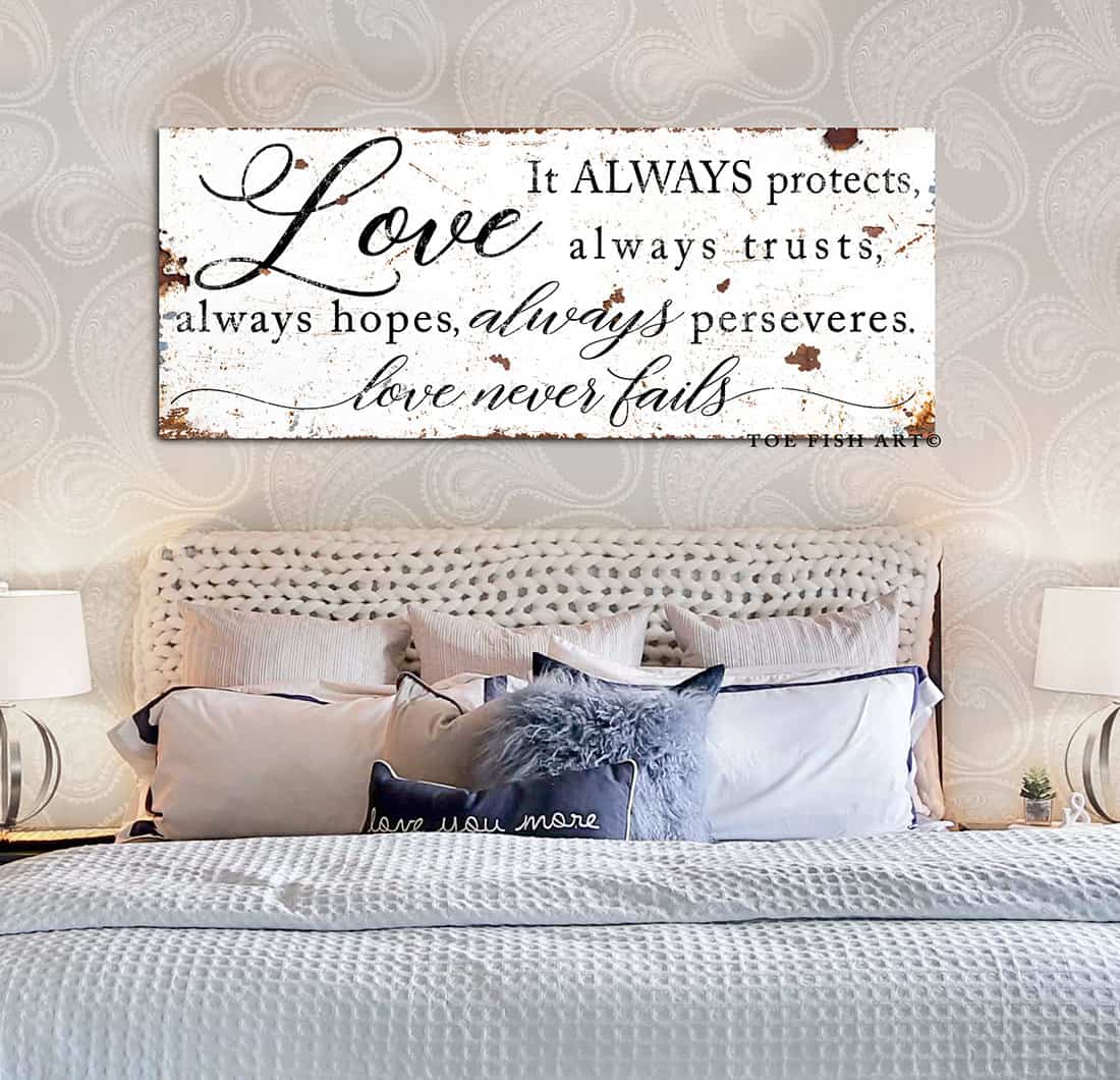 Love Never Fails Sign handmade by ToeFishArt. Original, custom, personalized wall decor signs. Canvas, Wood or Metal. Rustic modern farmhouse, cottagecore, vintage, retro, industrial, Americana, primitive, country, coastal, minimalist.