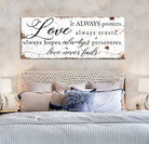 Love Never Fails Sign handmade by ToeFishArt. Original, custom, personalized wall decor signs. Canvas, Wood or Metal. Rustic modern farmhouse, cottagecore, vintage, retro, industrial, Americana, primitive, country, coastal, minimalist.