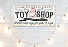 Santa's North Pole Toy Shop Sign handmade by ToeFishArt. Original, custom, personalized wall decor signs. Canvas, Wood or Metal. Rustic modern farmhouse, cottagecore, vintage, retro, industrial, Americana, primitive, country, coastal, minimalist.