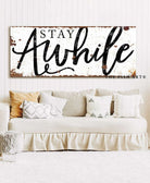 Stay Awhile Sign handmade by ToeFishArt. Original, custom, personalized wall decor signs. Canvas, Wood or Metal. Rustic modern farmhouse, cottagecore, vintage, retro, industrial, Americana, primitive, country, coastal, minimalist.
