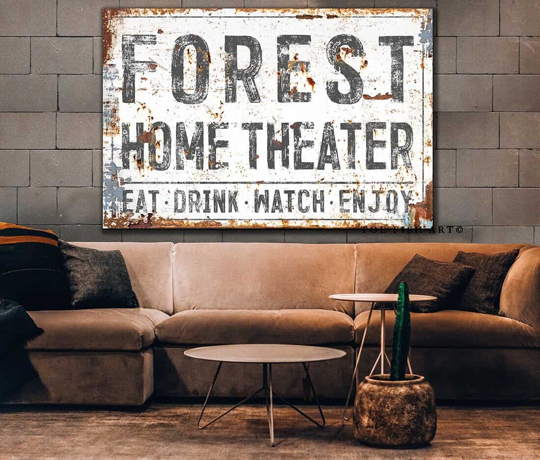 Ideal for media rooms, man caves, basements, or living areas. Make your TV space uniquely yours with Toe Fish Art's Personalized Family Name Rustic Theater—Home Theater Eat-Drink-Watch-Enjoy Sign. Be surrounded by decor you LOVE! Choose premium gallery-stretched canvas or elegant framed canvas. Toe Fish Art makes artisan wall art with American materials. Proudly Made in the USA, each piece is expertly constructed with genuine craftsmanship, heritage quality, and rustic charm.