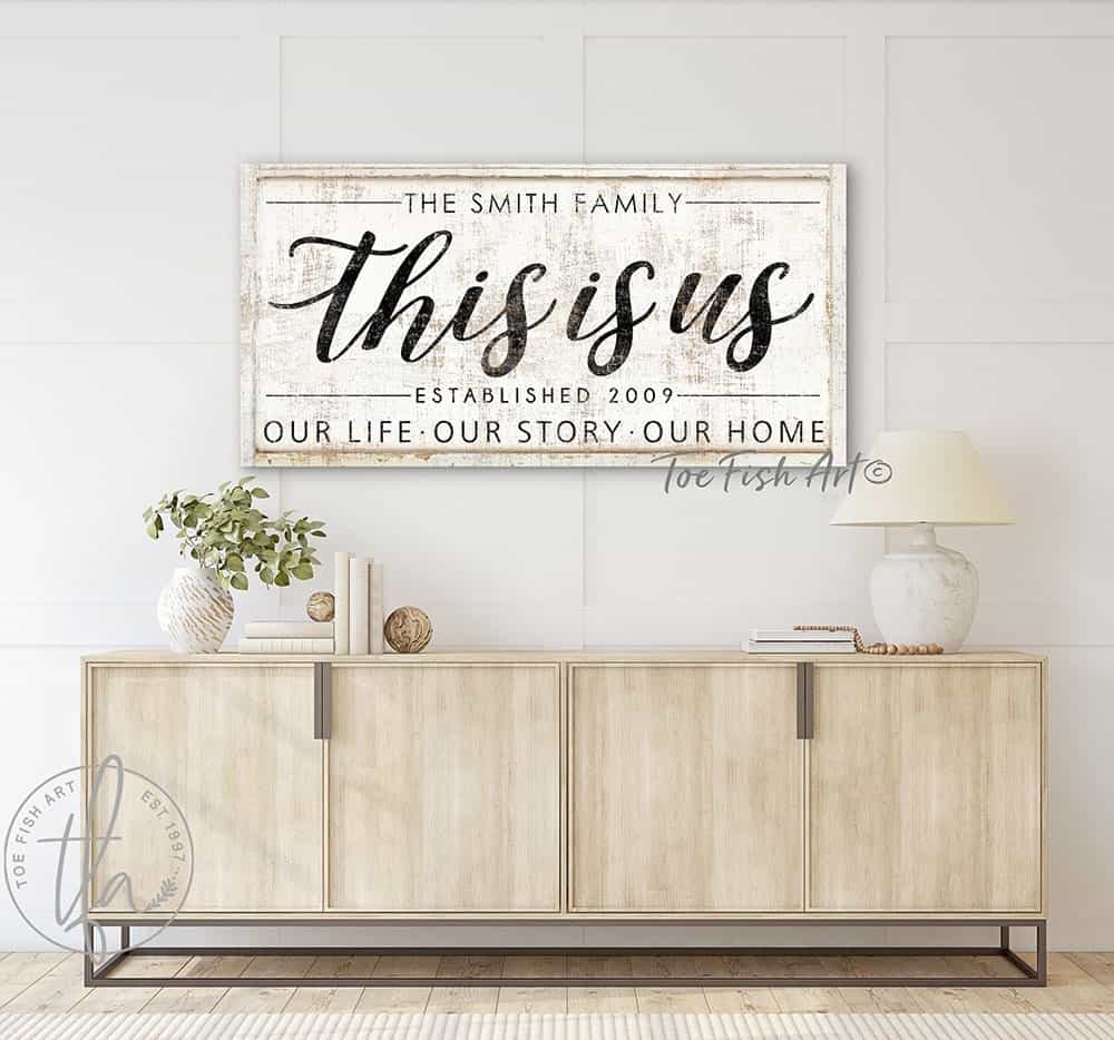 This Is Us Family Sign handmade by ToeFishArt. Original, custom, personalized wall decor signs. Canvas, Wood or Metal. Rustic modern farmhouse, cottagecore, vintage, retro, industrial, Americana, primitive, country, coastal, minimalist.