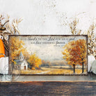 Toe Fish Art's Faith-inspired wall art featuring Psalm 107:1 ‘Give thanks to the Lord for He is good, His love endures forever’ hand-lettered on a rustic country church scene surrounded by golden autumn trees landscape painting. Handmade in the USA and constructed in framed canvas or waterproof outdoor metal. Vintage fall colors, perfect for Christian home décor, Thanksgiving, or seasonal autumn cottagecore decor.