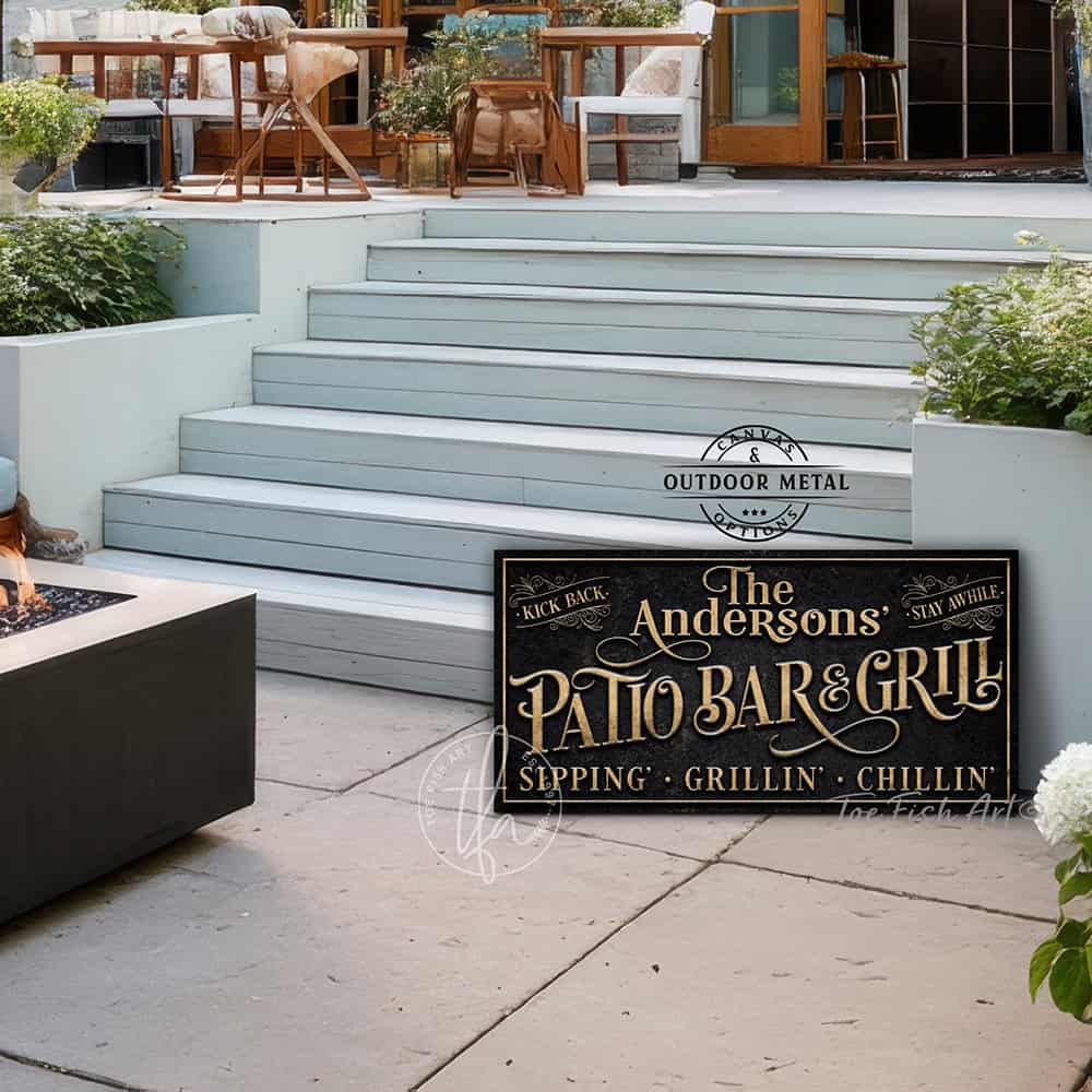 Welcome to the Patio Bar & Grill custom wall sign by Toe Fish Art, handmade in the USA in waterproof outdoor metal or framed canvas, vintage black with rustic gold, personalized family name text, and fun sayings like Kick Back-Stay Awhile, Sipping-Grilling-Chilling. Charming outdoor kitchen, bar, lounge, patio, lanai, deck, porch, or pool decor. Ideal for upgrading your outdoor summer vibe. Built to last with genuine craftsmanship, this authentic sign adds classic charm and heritage quality to any space.