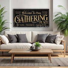 Toe Fish Art's customizable Gathering Place Sign available in framed canvas or outdoor waterproof metal, featuring fun wording options and personalized family name text. Designed in vintage black with rustic gold-style lettering for a sleek, classy look that fits any indoor or outdoor setting. This stylish wall decor is perfect for patios, porches, or entertaining spaces. Handmade in the USA and built to last with genuine craftsmanship, ideal for adding personality to your favorite gathering place.