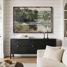 This landscape artwork by Toe Fish Art captures rural tranquility with a spring river meadow scene steeped in cottagecore tradition. The imagery balances nostalgic charm with sophisticated elegance. Available in framed canvas or weather-resistant outdoor metal in numerous sizes to fit your space. Toe Fish Art creates artisan-made wall décor using American sourced materials. Proudly Made in the USA, each sign is expertly constructed with genuine craftsmanship, heritage quality, and rustic charm.