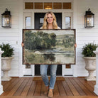 This landscape artwork by Toe Fish Art captures rural tranquility with a spring river meadow scene steeped in cottagecore tradition. The imagery balances nostalgic charm with sophisticated elegance. Available in framed canvas or weather-resistant outdoor metal in numerous sizes to fit your space. Toe Fish Art creates artisan-made wall décor using American sourced materials. Proudly Made in the USA, each sign is expertly constructed with genuine craftsmanship, heritage quality, and rustic charm.
