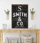 Rustic Vertical Family Name & Co. Sign with Initial and Established Date Personalized Canvas or Metal Rustic-Industrial Sign, Custom Options, wall hanging canvas or outdoor exterior metal great for outdoor living spaces wall decor handmade in the USA by the Toe Fish Art family artists. Original, custom, personalized wall decor signs. Canvas, Wood or Metal. Rustic modern farmhouse, cottagecore, vintage, retro, industrial, Americana, primitive, country, coastal, minimalist.