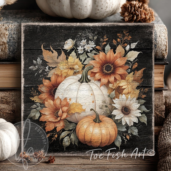 Toe Fish Art rustic fall wall art with white and orange pumpkins, sunflowers, and autumn leaves on a distressed wood background.