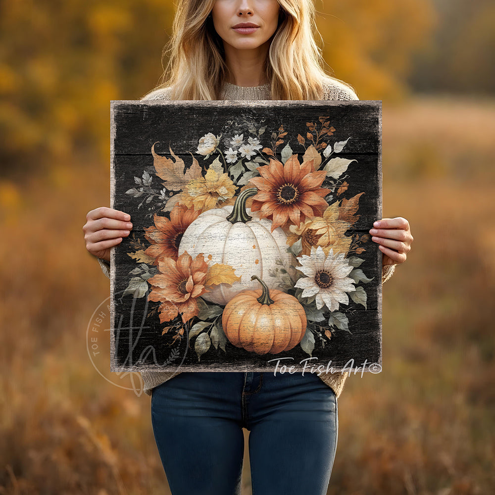 Toe Fish Art rustic fall wall art with white and orange pumpkins, sunflowers, and autumn leaves on a distressed wood background.