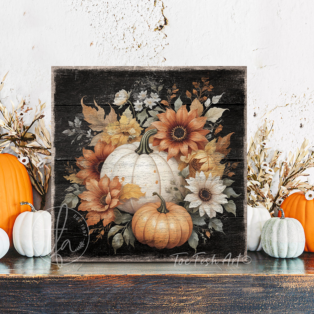 Toe Fish Art rustic fall wall art with white and orange pumpkins, sunflowers, and autumn leaves on a distressed wood background.