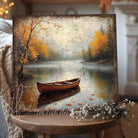 Toe Fish Art Rustic autumn wall art featuring a wooden canoe on a misty lake surrounded by golden fall trees and calm reflections.