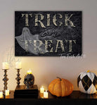Trick or Treat Ghost Sign handmade by ToeFishArt. Trick or Treat Ghost Sign handcrafted in the USA in Indoor Canvas or Outdoor Metal for the ultimate Halloween Home Decor. Original, custom, personalized wall decor signs. Canvas, Wood or Metal. Rustic modern farmhouse, cottagecore, vintage, retro, industrial, Americana, primitive, country, coastal, minimalist.