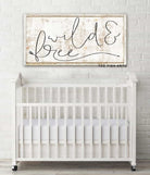 Wild & Free Sign handmade by ToeFishArt. Original, custom, personalized wall decor signs. Canvas, Wood or Metal. Rustic modern farmhouse, cottagecore, vintage, retro, industrial, Americana, primitive, country, coastal, minimalist.