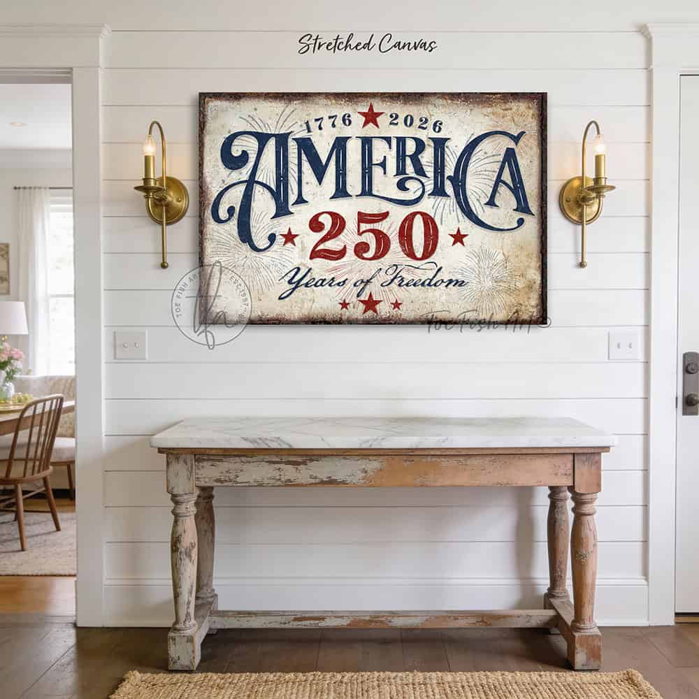 American independence anniversary celebrating 1776–2026: "250 Years of Freedom" vintage patriotic wall art in rustic red, white, and blue Americana style, designed and made exclusively by Toe Fish Art. Be surrounded by decor you LOVE! Choose premium framed canvas or durable outdoor metal. Toe Fish Art makes artisan wall art with American materials. Proudly Made in the USA, each piece is expertly constructed with genuine craftsmanship, heritage quality, and rustic charm.