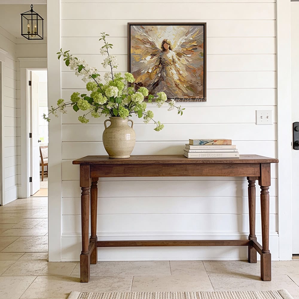 This stunning abstract angel wall art by Toe Fish Art blends contemporary design with meaningful spiritualism. Inspired by impasto-style paintings, the artwork features soft, layered textures and neutral yet bold tones. Be surrounded by decor you LOVE! Choose premium gallery-stretched canvas or elegant framed canvas. Toe Fish Art makes artisan wall art with American materials. Proudly Made in the USA, each piece is expertly constructed with genuine craftsmanship, heritage quality, and rustic charm.