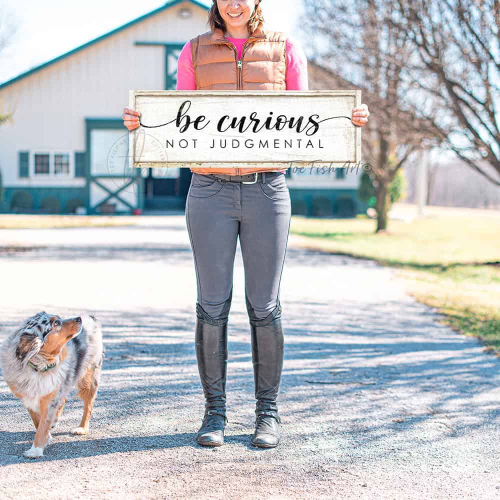 "Be Curious Not Judgmental" invites you to live with intention. This modern farmhouse wall art by Toe Fish Art serves as a reminder to approach life with kindness. Featuring neutral vintage tones that complement any space. Be surrounded by decor you LOVE! Choose premium gallery-stretched canvas or elegant framed canvas. Toe Fish Art makes artisan wall art with American materials. Proudly Made in the USA, each piece is expertly constructed with genuine craftsmanship, heritage quality, and rustic charm.