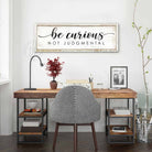 "Be Curious Not Judgmental" invites you to live with intention. This modern farmhouse wall art by Toe Fish Art serves as a reminder to approach life with kindness. Featuring neutral vintage tones that complement any space. Be surrounded by decor you LOVE! Choose premium gallery-stretched canvas or elegant framed canvas. Toe Fish Art makes artisan wall art with American materials. Proudly Made in the USA, each piece is expertly constructed with genuine craftsmanship, heritage quality, and rustic charm.