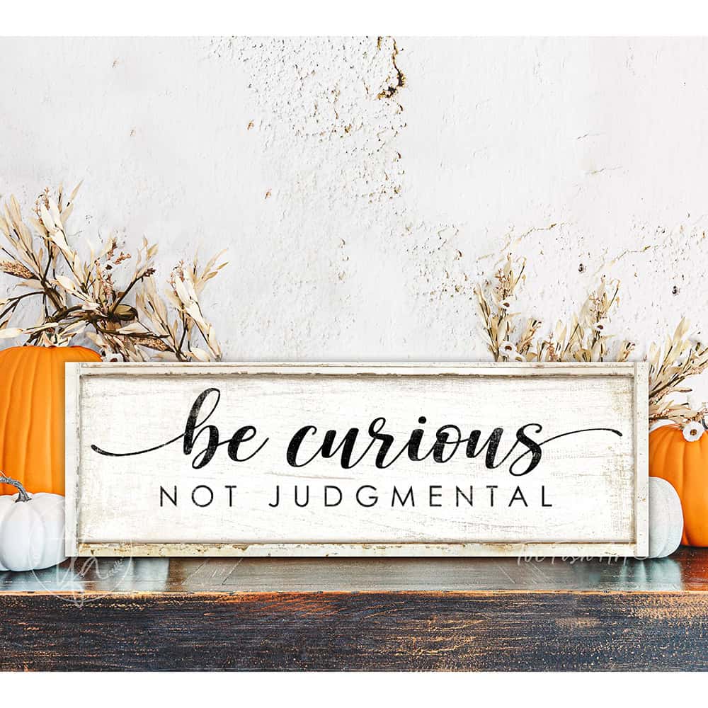 "Be Curious Not Judgmental" invites you to live with intention. This modern farmhouse wall art by Toe Fish Art serves as a reminder to approach life with kindness. Featuring neutral vintage tones that complement any space. Be surrounded by decor you LOVE! Choose premium gallery-stretched canvas or elegant framed canvas. Toe Fish Art makes artisan wall art with American materials. Proudly Made in the USA, each piece is expertly constructed with genuine craftsmanship, heritage quality, and rustic charm.