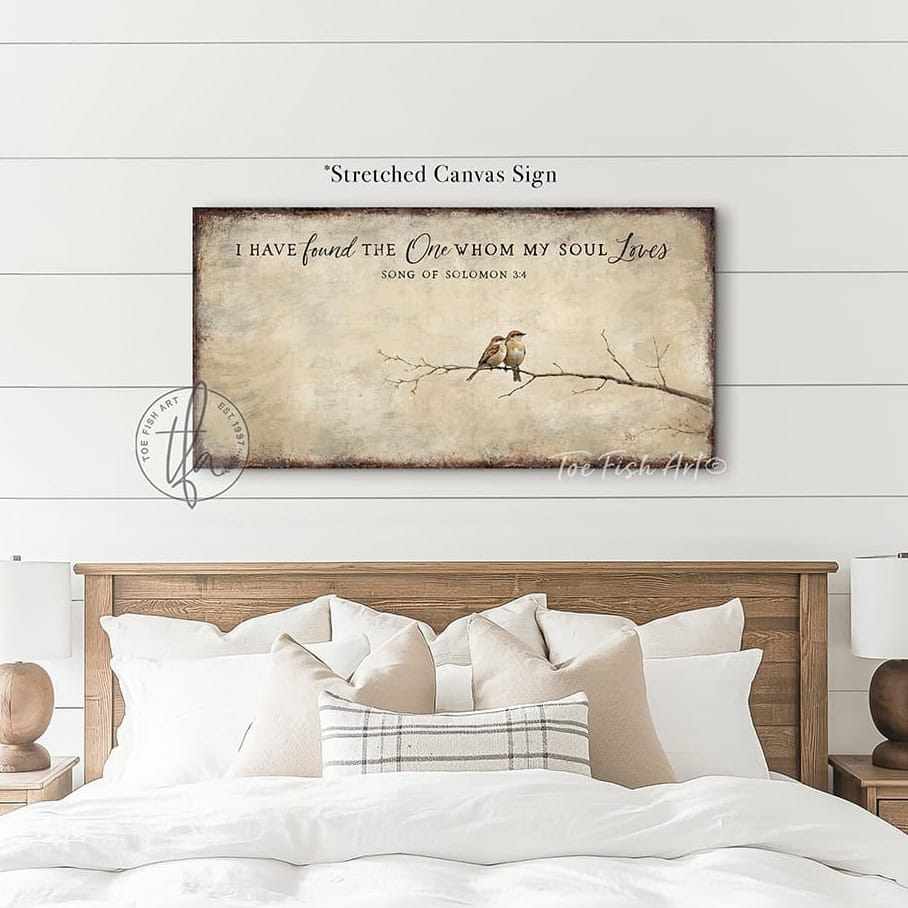This faith-based wall decor brings the message "I Have Found the One Whom My Soul Loves" to your home through a quaint depiction of two love birds sharing a quiet moment. The artwork conveys a sense of peace, calm, and deep connection. Choose between premium framed canvas or durable outdoor metal. Toe Fish Art makes artisan wall art with American materials. Proudly Made in the USA, each piece is expertly constructed with genuine craftsmanship, heritage quality, and rustic charm.