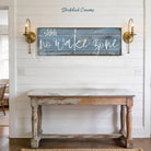Bring laid-back lake life to your space with Toe Fish Art's "Shhh… No Wake Zone" sign. Featuring a weathered rustic blue finish, hand-lettered white typography, and the look of reclaimed wood, this timeless but trendy design adds relaxed coastal vibes. Choose between premium framed canvas or durable outdoor metal. Toe Fish Art makes artisan wall art with American materials. Proudly Made in the USA, each piece is expertly constructed with genuine craftsmanship, heritage quality, and rustic charm.