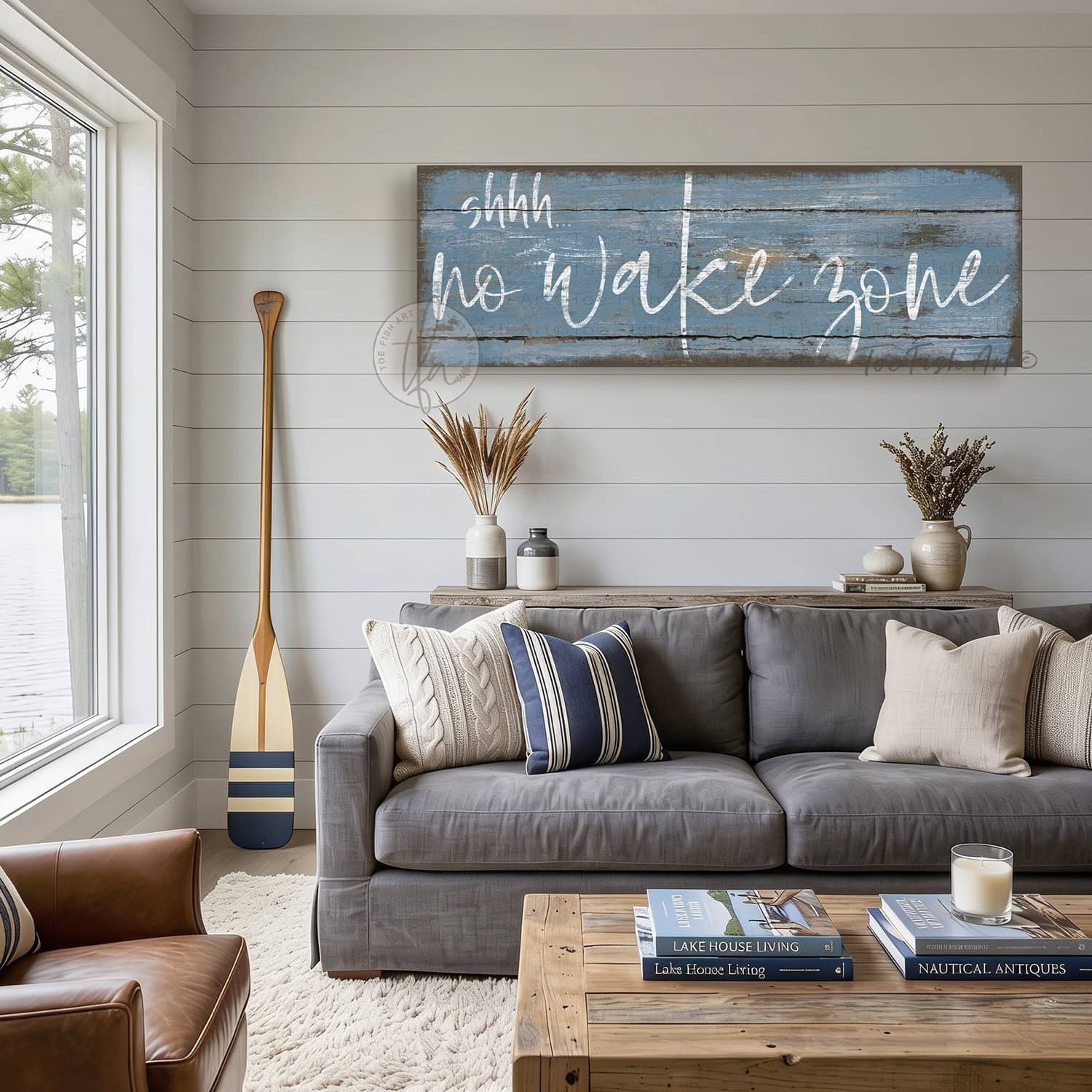 Bring laid-back lake life to your space with Toe Fish Art's "Shhh… No Wake Zone" sign. Featuring a weathered rustic blue finish, hand-lettered white typography, and the look of reclaimed wood, this timeless but trendy design adds relaxed coastal vibes. Choose between premium framed canvas or durable outdoor metal. Toe Fish Art makes artisan wall art with American materials. Proudly Made in the USA, each piece is expertly constructed with genuine craftsmanship, heritage quality, and rustic charm.