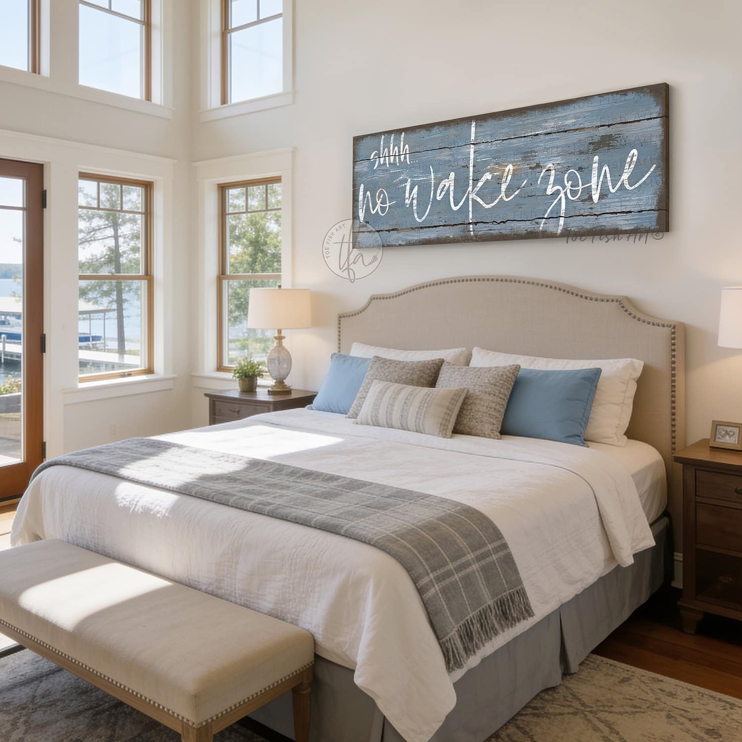 Bring laid-back lake life to your space with Toe Fish Art's "Shhh… No Wake Zone" sign. Featuring a weathered rustic blue finish, hand-lettered white typography, and the look of reclaimed wood, this timeless but trendy design adds relaxed coastal vibes. Choose between premium framed canvas or durable outdoor metal. Toe Fish Art makes artisan wall art with American materials. Proudly Made in the USA, each piece is expertly constructed with genuine craftsmanship, heritage quality, and rustic charm.