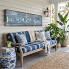 Bring laid-back lake life to your space with Toe Fish Art's "Shhh… No Wake Zone" sign. Featuring a weathered rustic blue finish, hand-lettered white typography, and the look of reclaimed wood, this timeless but trendy design adds relaxed coastal vibes. Choose between premium framed canvas or durable outdoor metal. Toe Fish Art makes artisan wall art with American materials. Proudly Made in the USA, each piece is expertly constructed with genuine craftsmanship, heritage quality, and rustic charm.