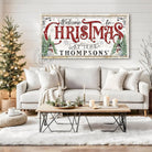 Add a playful touch to your holiday decor with this vintage cottage-style “Welcome to Christmas” sign by Toe Fish Art. Available in pink & green or classic red & green, featuring gingerbread house or snowman designs with Christmas trees. Personalizable canvas or outdoor metal sign, perfect for entryways, porches, mantels, or living spaces. Brings festive charm and whimsy to any home or seasonal celebration.