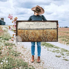 This rustic cottage wall art features lush wildflowers dancing across a vintage floral landscape, evoking warmth and natural beauty. Add optional bible verse "Be Still And Know That I Am God"—Psalm 46:10 for meaningful faith-based decor. Be surrounded by decor you LOVE! Choose premium framed canvas or durable outdoor metal. Toe Fish Art makes artisan wall art with American materials. Proudly Made in the USA, each piece is expertly constructed with genuine craftsmanship, heritage quality, and rustic charm.