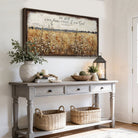 This rustic cottage wall art features lush wildflowers dancing across a vintage floral landscape, evoking warmth and natural beauty. Add optional bible verse "Be Still And Know That I Am God"—Psalm 46:10 for meaningful faith-based decor. Be surrounded by decor you LOVE! Choose premium framed canvas or durable outdoor metal. Toe Fish Art makes artisan wall art with American materials. Proudly Made in the USA, each piece is expertly constructed with genuine craftsmanship, heritage quality, and rustic charm.