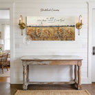 This cottagecore wall art by Toe Fish Art features lush wildflowers in a vintage floral landscape, evoking warmth and natural beauty. Add optional bible verse "Be Still And Know That I Am God"—Psalm 46:10 for meaningful faith-based decor. Be surrounded by decor you LOVE! Choose premium framed canvas or durable outdoor metal. Toe Fish Art makes artisan wall art with American materials. Proudly Made in the USA, each piece is expertly constructed with genuine craftsmanship, heritage quality, and rustic charm.